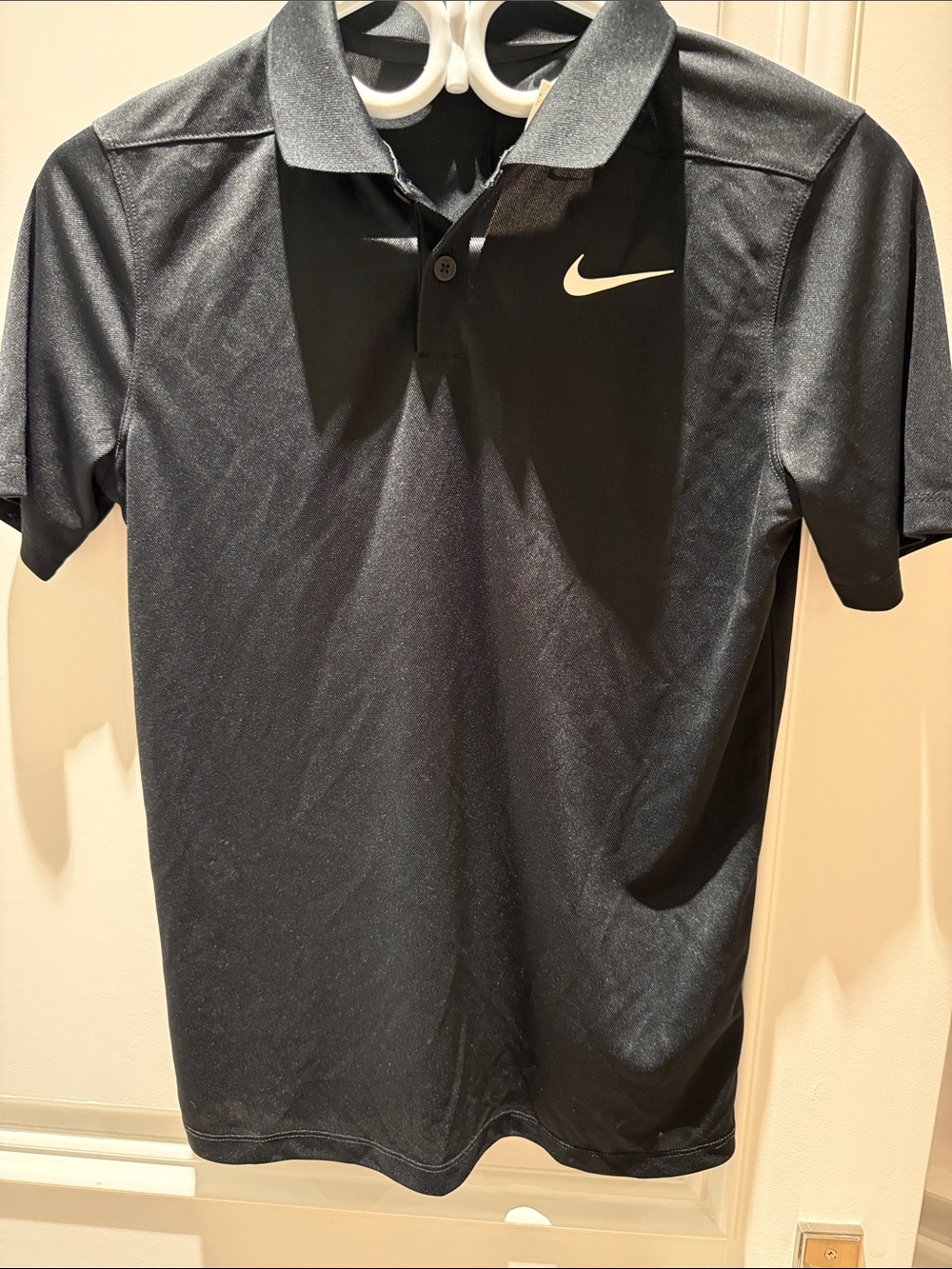 Nike Black Polo Shirt with White Swoosh